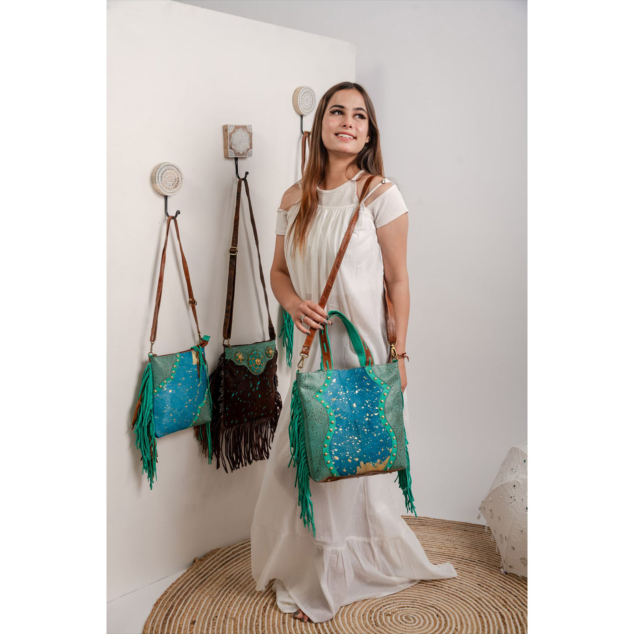 14002-7.jpg Cowhide Tooling Carving Fringe Bag - Image 1
