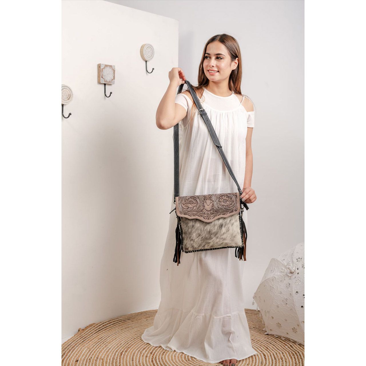 14011-7.jpg Cowhide Tooling Carving Sling Bag - Image 1