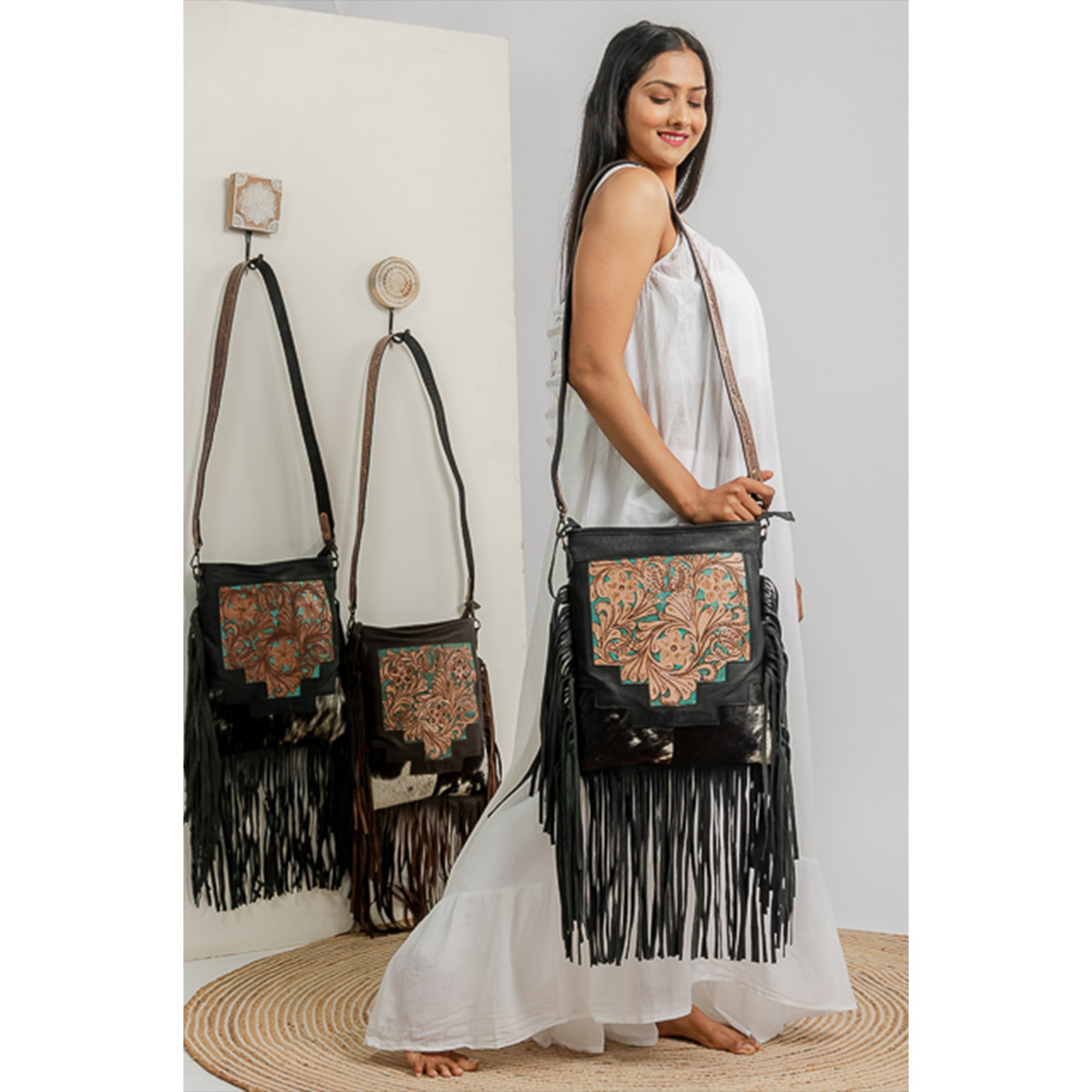 14105-1.jpg Cowhide Tooling Carving Fringe Bag - Image 1