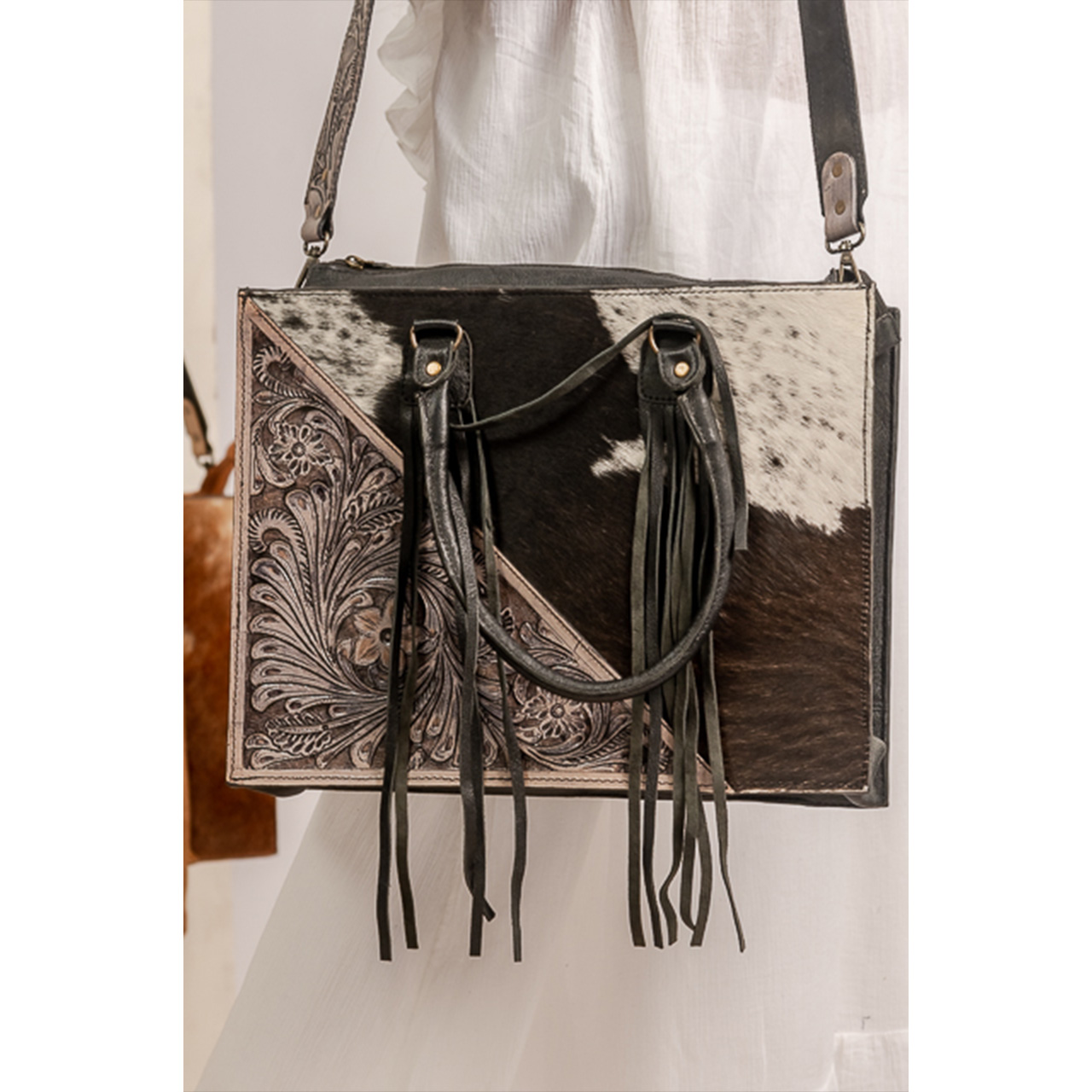 14107-1.jpg Cowhide Tooling Carving Tote - Image 1