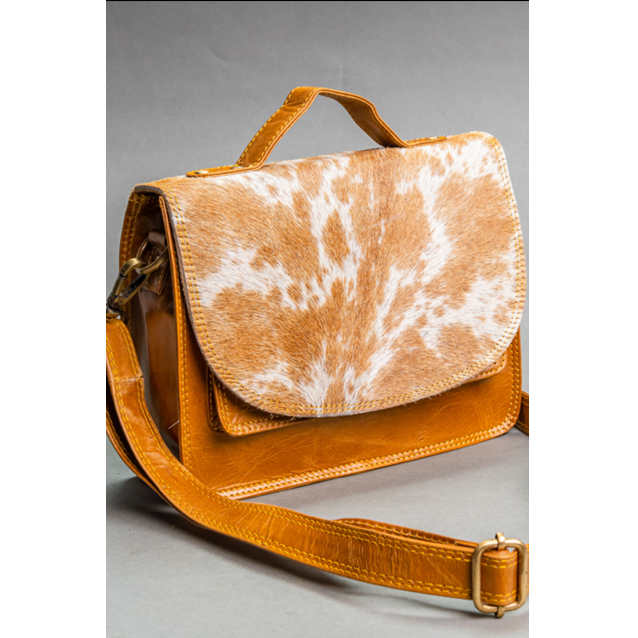 19006-1.jpg Pocket Cowhide Sling Bag - Image 1
