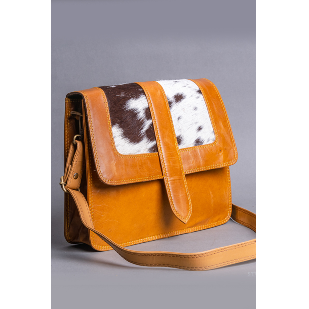 19013-4.jpg Cowhide Sling Bag - Image 1