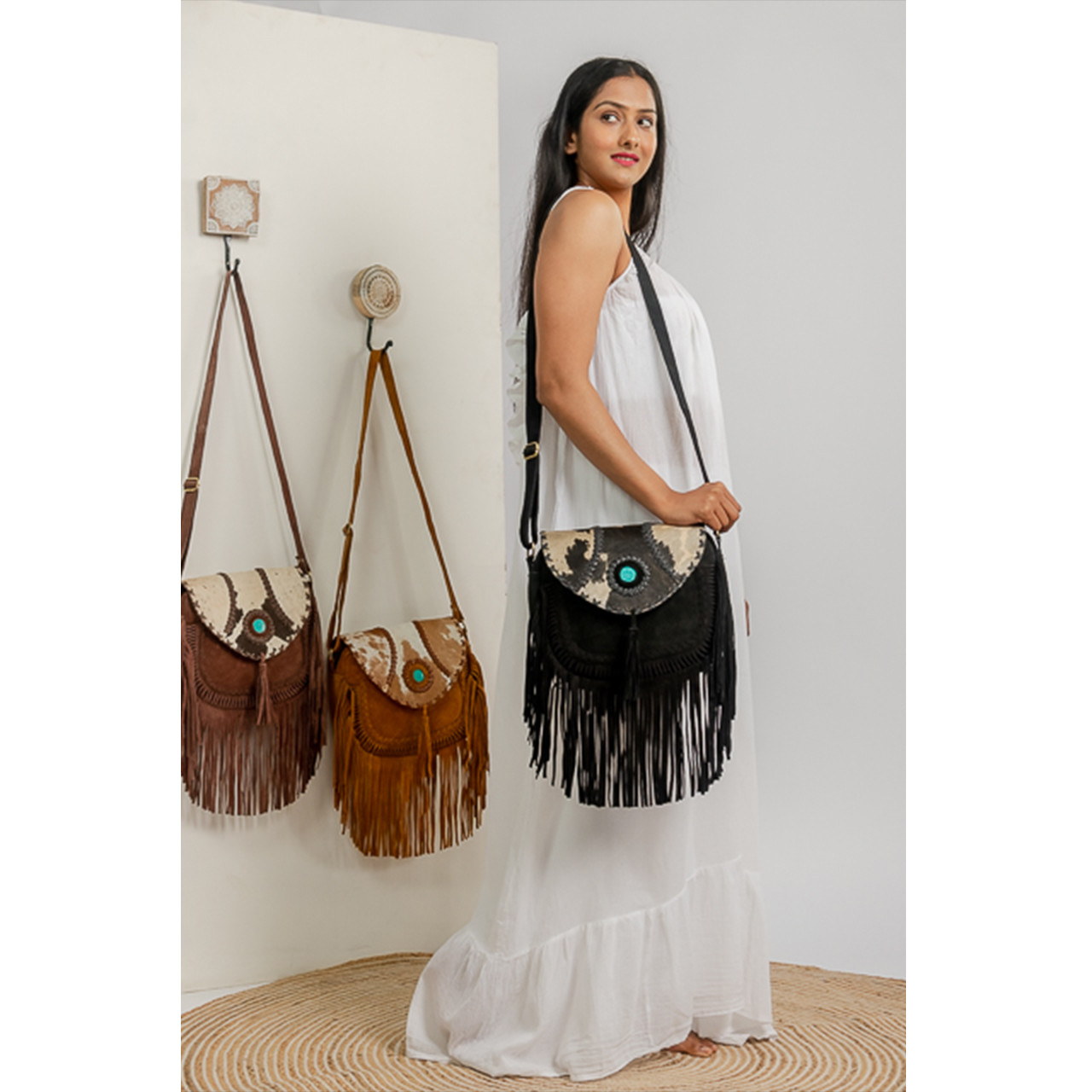 19078-1.jpg Hand Stitch Cowhide Fringe Bag - Image 1